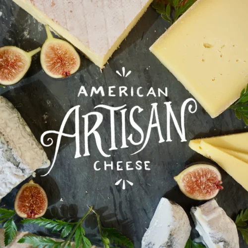 The words "American Artisan Cheese" are surrounded by wedges of domestic cheeses and figs. The link takes you to a sign up form for our "American Artisan Cheese" course.