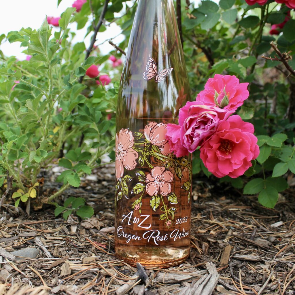 bottle of a to z wine in a rose bush