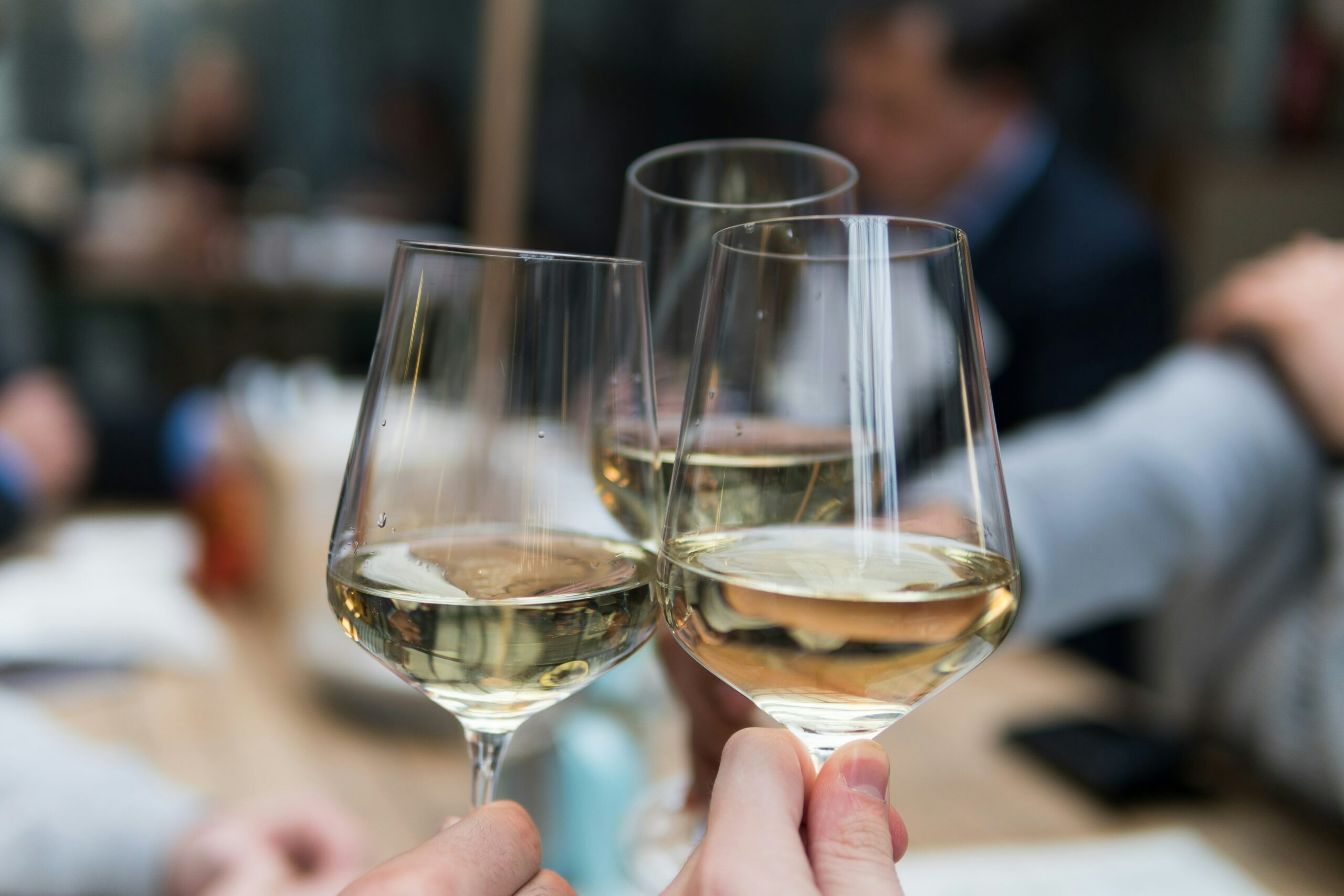 Three glasses of white wine