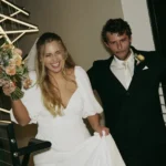 a photo of a bride and groom smiling