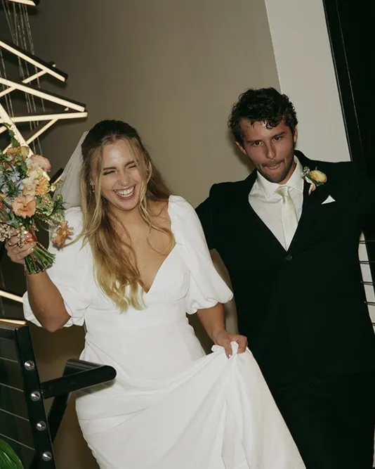 a photo of a bride and groom smiling