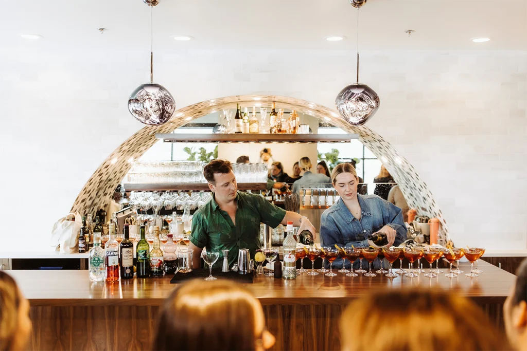 F44 bartenders making drinks during fundraiser