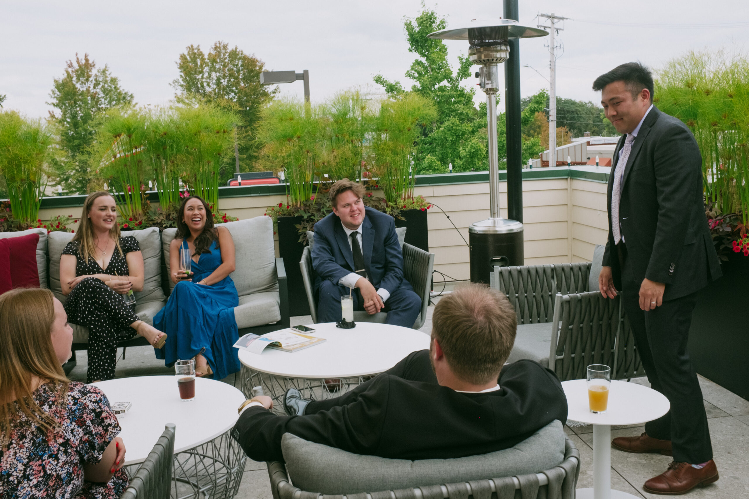 People sitting around enjoying drinks on the patio
