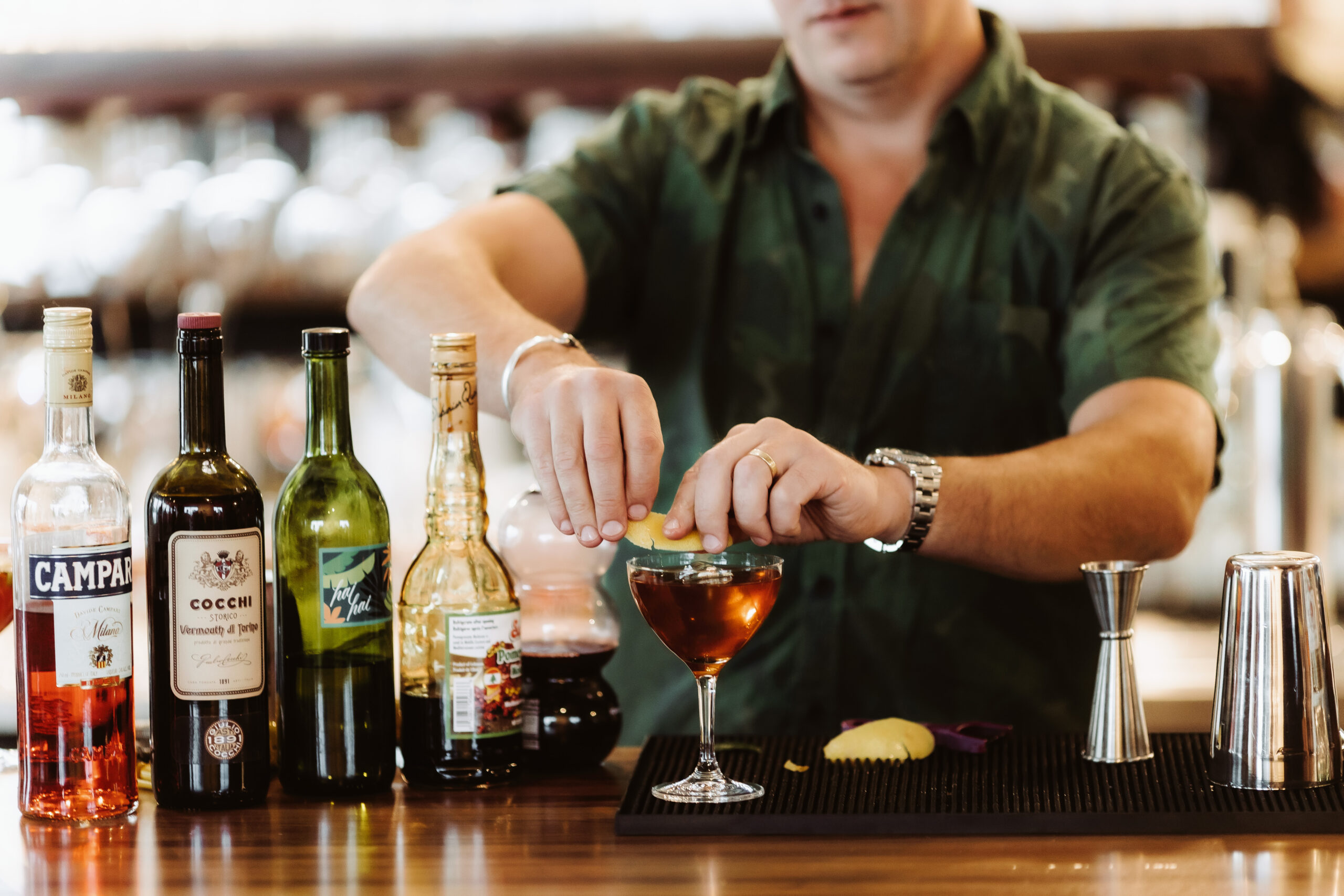 Bartender mixes a drink