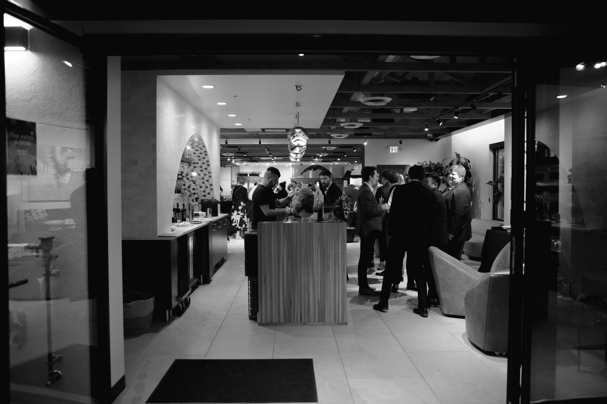 black and white view of the event space lounge during a wedding