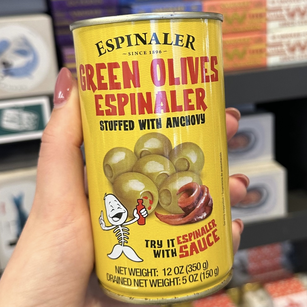 Yellow can of green stuffed olives